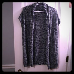 Sleeveless sweater cardigan.